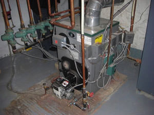 diagram of a oil boiler system, with notes on replacement, service, and installation