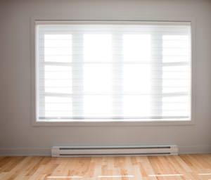 A radiant heating system underneath a window in a Southern NJ home