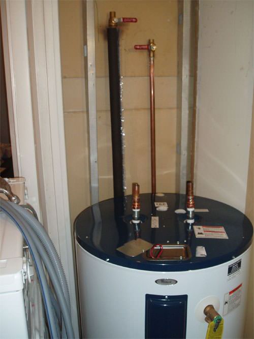 A water heater system (tank style) installed in a Southern NJ home